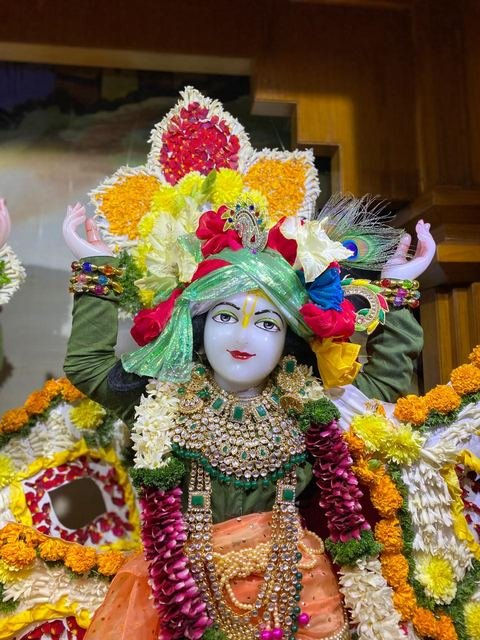 Deities adorned with flowers for Pushpa Abhishek at ISKCON Satara — photo 4 of 10